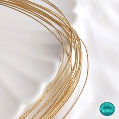 Kindly Note: this is real gold plated jewelry wire,it is not that easy to get tarnished. ♨ Use:For Making Bracelet,necklace,usually use with the stone beads. See more Items: https://www.etsy.com/shop/Annieslittlethings ♨ Color: Gold ♨ Shipping: Dear,Customer,I usually ship the Item through E-pack (the updrade China Post) It will take 2-3 Weeks to US It will take 2-4 Weeks to other countries Gold Wire Wrapped Jewelry For Anniversary, Gold Wire Wrapped Jewelry With Round Beads, Wire Wrapped Gold Jewelry With Round Beads, Gold Wire-wrapped Jewelry With Round Beads, Wire Jewerly, Pumpkin Bead, Wire Diy, Pearl Clasp, Twisted Wire