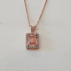 "Warm up your style with the beautiful pink hues of this morganite and diamond pendant necklace, set in elegant rose gold. This necklace is made of solid 14k yellow gold and set with natural morganite and diamonds. WHAT WILL YOU GET IN THIS PURCHASE? * A beautiful morganite necklace * Elegant jewelry box pack * Free DHL express worldwide shipping * Certificate of authenticity SPECS: MATERIAL: Solid 14k rose gold WEIGHT: 2.80 gram MAIN GEMSTONE: Morganite DIAMONDS: Natural DIAMOND QUANTITY: 24 DIAMOND CT WEIGHT: 0.16 ct DIAMOND CLARITY: VS1 DIAMOND COLOR: G Morganite and diamonds necklace 14k rose gold handmade pendant natural pink gemstone rectangle halo diamond charm CUSTOM AND PERSONALIZED ORDERS: I gladly accept personalized order, so you can get unique pieces made just for you. WHOLESA Square Gold Pendant, Newton Quotes, Morganite Necklace, Morganite Jewelry, Morganite Pendant, Minimal Jewellery, 26th Birthday, Diamonds Necklace, Morganite Diamond