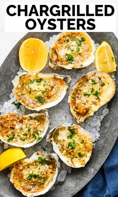 an image of grilled oysters on ice with lemon wedges