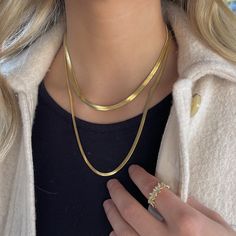 Step up your style with this elegant yet simple golden necklace. This product is our best seller! These neckless are solid stainless steel so it is water resistant and will not fade, turn or tarnish!2 Sizes available: Skinny: 3MM wide and 20 inches long. Perfect for layering! Wide: 5MM wide for the thicker style, 17 inches long. Gold Herringbone Necklace For Everyday Wear, Everyday Gold Herringbone Necklace, Gold Minimalist Herringbone Necklace, Trendy Gold Snake Chain Necklace With Adjustable Chain, Trendy Gold Snake Chain Necklace With Delicate Chain, Gold Minimalist Herringbone Necklace With Clavicle Chain, Gold Stainless Steel Choker Chain Necklace, Gold Stainless Steel Choker Necklace, Gold Double Chain Snake Necklace For Everyday