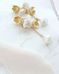 p Dainty White Dangle Bridal Earrings, White Dangle Bridal Earrings, Delicate Dangle Chandelier Earrings, White Long Drop Chandelier Earrings For Wedding, Delicate Petal-shaped Flower Earrings For Wedding, Delicate White Chandelier Drop Earrings, Graceful White Dangle Bridal Earrings, White Long Drop Bridal Earrings For Wedding, Graceful White Wedding Earrings