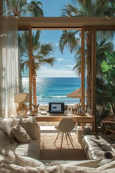 a living room filled with furniture next to a window covered in curtains and palm trees