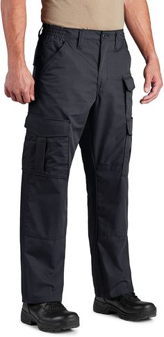 PRICES MAY VARY. READY FOR DUTY: Designed with the job in mind, our Uniform Tactical Pant has all the premium, multifunctional features at an affordable price, so can you report to duty with a classic and professional look CARRY IT ALL: Extra large belt loops are designed for a nylon duty belt. There are 2 back pockets with hook and loop closure, 2 front pockets with reinforced opening for folding knife or tool clip, and 2 double cargo pockets with open-top slash pockets COMFORT + PERFORMANCE: M Men's Uniform, Duty Belt, Large Belt, Safety Clothing, Tactical Pants, Knee Pads, Professional Look, Folding Knife, Folding Knives