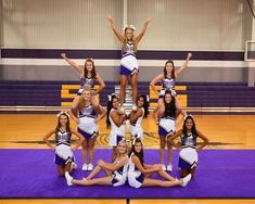 the cheerleaders are posing for a group photo