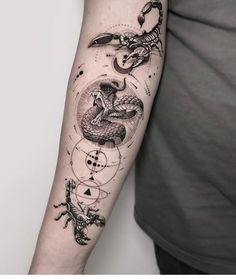 a man with a tattoo on his arm that has an image of a snake and other animals