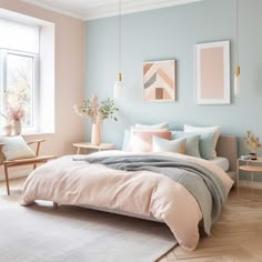 a bedroom with pale blue walls and pink bedding, white rugs and wooden flooring