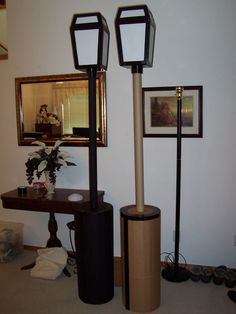 three lamps are sitting next to each other on the floor