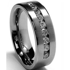 a wedding ring with three rows of diamonds