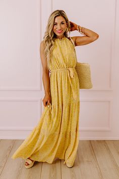 You are sure to feel nothing but happiness when you dress to impress in this beautiful primrose yellow colored maxi featuring lightweight flowy material patterned with a subtle floral print, a high neckline with a halter tie closure, ruffled trim detailing, a cinched waistline with a tie belt, and a relaxed tiered skirt silhouette that cascades into a straight ankle-length hemline! Measurements S : Bust 30", Hip 38", Length 54", Waist 26-28". M : Bust 32", Hip 40", Length 54", Waist 28-30". L : Primrose Yellow, Feel Nothing, Plaid Jacket, Model Fits, Women Clothing Boutique, Tiered Skirt, High Neckline, Tie Belt, Hip Length