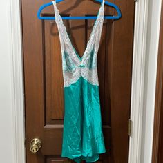 Victoria’s Secret Babydoll In Satin. Emerald Green With White Lace. Adjustable Cross Back Straps With Low Back. Never Worn. Size Large Fitted Lace Trim Backless Sleepwear, Green Camisole For Bedtime, Sheer Sleeveless Green Sleepwear, Green Sheer Sleeveless Sleepwear, Victoria's Secret Blue Sheer Sleepwear, Victoria's Secret Sheer Blue Sleepwear, Green Sleeveless Sleepwear With Lace Trim, Fitted Green Sleepwear With Lace Trim, Low Back