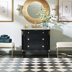 a black and white checkered floor in a bathroom with gold accents on the mirror