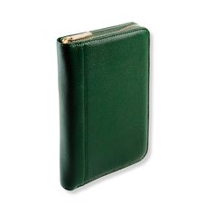 a green leather wallet on a white background