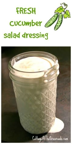 fresh cucumber salad dressing in a glass jar with the words, fresh cucumber salad dressing