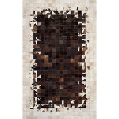 a brown and white area rug with squares on the top, in various shades of brown