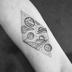 a black and white photo of a tattoo design on the left arm with pizza slices