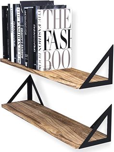 two bookshelves made out of wood with black metal brackets on each shelf and the same book