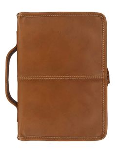 a brown leather notebook with two straps on the front and one strap at the back