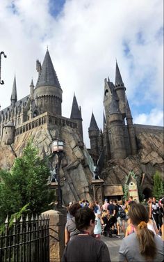 the wizard's castle at universal studios is shown in front of a cloudy sky