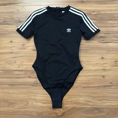 Brand New, With Tags. Size: Xs. Color: Black/White. Style: Ed7507. Please Make Official Offers And Bundles! Fast Shipping, Generally Ships Next Business Day! Casual Black Elastane Bodysuit, Black Sports Bodysuit For Spring, Black Bodysuit For Sports In Spring, Black Tops With Adidas Branding For Streetwear, Spring Sports Black Bodysuit, Trendy Black Bodysuit For Sports, Black Spring Sports Bodysuit, Casual White Elastane Bodysuit, Adidas Fitted Tops For Streetwear