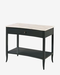 a black table with a white marble top