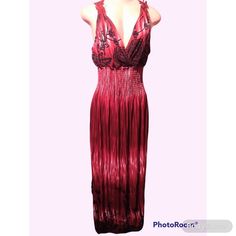 Brand new burgundy with black flowers maxi dress with an embroidered lace back. This maxi dress has a stretchy pleated waist. Could be worn a lot of different places, weddings, pregnancy, church, to name a few. Material: polyester 95%, Spandex 5%. Stretches to 2X. Size L= US 8-10, Length 53.5"Size XL= US 12-14, Length 54" Fitted Burgundy Maxi Dress For Prom, Burgundy Maxi Dress For Party, Fitted Burgundy Prom Maxi Dress, Burgundy Sleeveless Maxi Dress For Prom, Burgundy Maxi Evening Dress, Fitted Floor-length Burgundy Maxi Dress, Burgundy Floor-length Maxi Dress For Prom, Elegant Burgundy Maxi Dress For Summer, Elegant Burgundy Evening Maxi Dress