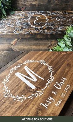 two wooden cutting boards with the number one on them and an image of a wreath