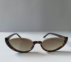 Oval cat eye gold framed sunglasses Two variations  Black and Leopord print Retro Cats, Black Sunglasses, Sunglass Frames, Eyewear Sunglasses, Gold Frame, Cat Eye, Sunglasses Accessories, Beauty Book, Accessory Gift