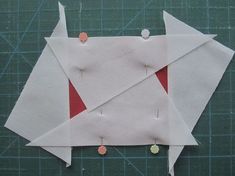 an origami piece is cut into pieces