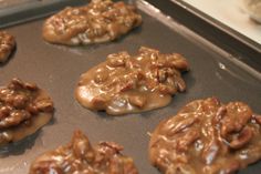 chocolate cookies with pecans and caramel drizzled on top are ready to go into the oven