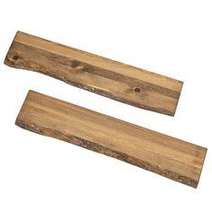 two pieces of wood sitting next to each other