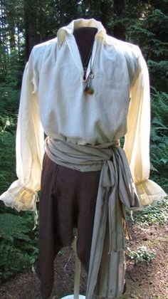 Pirate Undershirt, Simple Medieval Outfit Male, Mens Ren Faire Outfit Pirate, Medieval Mens Outfit, Mid Evil Outfits Men, Ren Fair Male Outfit, Commoner Clothing Male, Pirate Male Costume, Pirate Inspired Outfits Male