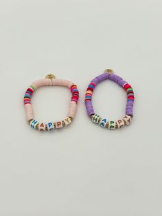 New styles added!! Multi-colored clay bracelets with positive phrases like HAPPY, BEAUTIFUL, HUGS, FEARLESS, XOXO, STRONG, DREAMKIND, BESTIE, LOVE, SMILE, BRAVE, BFF, JOY & a simple heart. Adorable by itself or stacked with a few other bracelets from our collections. Choose which phrase you want below and watch her gleam with pride while wearing them. $18 By Little Miss Zoe Clay Bracelets, Happy Lights, Colored Clay, Heart Lights, Positive Phrases, Event Sign, Clay Bracelet, Children's Boutique, Boys Accessories