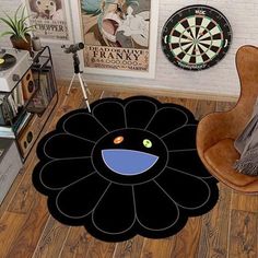 a living room with a chair and darts on the wall next to it is an image of a flower