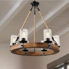 Lurav 25" Wide Natural Wood 6-Light Wagon Wheel Chandelier - #160X1 | Lamps Plus Farmhouse Living Room Lighting, Living Room Lighting Tips, Wood Wagon, Farmhouse Chandeliers, Wheel Chandelier, Lounge Lighting, Wagon Wheel Chandelier, Kitchen Ceiling Lights, Farmhouse Chandelier