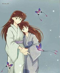 two people in kimonos hugging each other with butterflies flying around the sky behind them