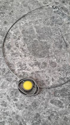 This geometric sterling silver yellow necklace is handmade and unique. Because of this tere may be a small difference in each piece. I used sterling silver (925k)with lost wax technique and and yellow enamel. This pendant was made sandblasting and than oxidized. This contemporary choker necklace are suitable for colored designs and geometric jewelry lovers.Other alternative colors please contact me.Dimensions of round shaped enameled piece are 1*1 cmOutside dimensions of the pendant 2.5*2 cmLeng Yellow Enamel Round Jewelry, Yellow Metal Necklace As Gift, Yellow Metal Necklace For Gift, Minimalist Yellow Jewelry As Gift, Minimalist Yellow Jewelry For Gifts, Minimalist Yellow Jewelry As A Gift, Minimalist Yellow Jewelry For Gift, Unique Yellow Jewelry With Large Pendant, Unique Yellow Necklace With Large Pendant