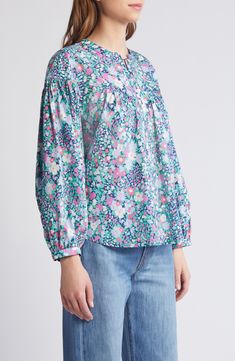 Meadow blooms proliferate on a cotton-poplin top fashioned with dropped shoulders and a curved hem that accentuates the flowy look. 24 1/2" length (size Medium) Button half placket Band collar Long sleeves with button cuffs 100% cotton Hand wash, line dry Imported Multicolor Floral Print Cotton Top, Printed Cotton Peasant Top For Spring, Printed Cotton Peasant Top, Flowy Cotton Blouse With Print, Flowy Cotton Printed Blouse, Multicolor Floral Print Tops For Daywear, Multicolor Cotton Floral Print Tops, Summer Cotton Peasant Top With Floral Print, Summer Peasant Top With Floral Print