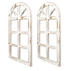 two white arched windows on a white background