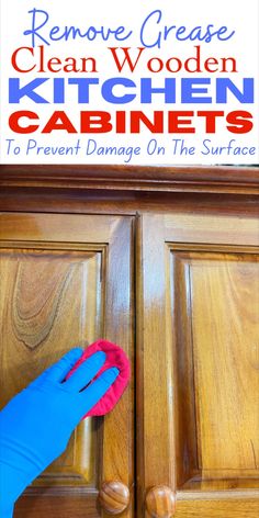 someone cleaning the kitchen cabinets with a blue glove and red mitt on their hand