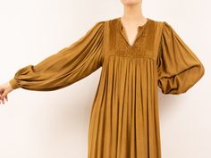 product details era: 70's fabric content: likely rayon colour: gold condition: great measurements sleeve length: 27" chest (around): 36" hip (around): 64" shoulder - shoulder: 18" shoulder - hem: 45" models measurements shoulder - shoulder: 17" bust: 33" waist: 25" hip: 37" height: 5'10" Bohemian Loungewear Dresses For Fall, Bohemian Fall Loungewear Dresses, 2023 Dress, Harvest Gold, Muslimah Fashion Outfits, Caftan Dress, African Wear, Muslimah Fashion, Kurta Designs