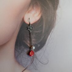 Exude old world elegance with every turn of your head with these handmade red coral sterling silver lotus earrings. The lotus in Chinese culture ranks as the highest of all flowers; it represents divinity and the best of the human spirit. Those delicate lotus earrings will remind you to be the best you can be each day you wear it. ⚜Item Specifics ❀ Natural Coral Dyed (10mm) ❀ Sterling Silver Ear Wire and Lotus ❀ Fresh Water Pearl 8mm ❀ Length: 2.5 Inch (65mm) Find more red coral jewelry here htt Elegant Red Flower Earrings With Ear Wire, Elegant Handmade Red Flower Earrings, Elegant Red Handmade Flower Earrings, Elegant Red Coral Earrings, Elegant Red Coral Jewelry With Natural Stones, Elegant Red Coral Drop Earrings, Red Spiritual Jewelry, Elegant Red Coral Dangle Earrings, Red Spiritual Dangle Earrings