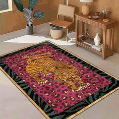 a rug with a tiger on it in a room next to a table and chair