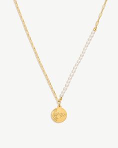 a necklace with a gold disc on a chain Floral Engraving, Perfume Jewelry, Alphabet Necklace, Different Flowers, Yellow Gold Pendants, Daily Reminder, Ring Bracelet, Accessories Bracelets, Personal Growth