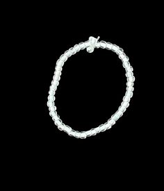 🤍 White simple seed bead bracelet 💡🫧 Clear Beaded Crystal Bracelet With Round Beads, Minimalist Crystal Bracelet With Faceted Beads, Minimalist Beaded Stretch Bracelet, Clear Faceted Round Beaded Bracelets, Clear Faceted Round Beads Bracelet, Minimalist Stretch Bracelet With Spacer Beads, Bracelet Simple, Seed Bead Bracelet, Seed Bead Bracelets