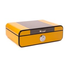 a yellow and black box with a clock on the front is isolated against a white background