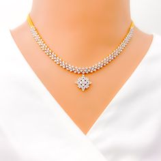 This exquisite 18k gold set, weighing a total of 26.0 grams, features a timeless design adorned with dazzling diamonds. The yellow gold finish enhances its luxurious appeal, making it perfect for any special occasion. The set includes a necklace with a total diamond weight of 8.20 carats, featuring F-G color and VS quality diamonds in round brilliant cut shapes. The necklace has a length of 15.75 inches with a 0.7-inch drop length, adjustable 1-inch links, and a secure lobster lock. The matching Formal Yellow Gold Hand-set Necklace, Formal Yellow Gold Hand Set Necklace, Formal Hand Set Yellow Gold Necklace, Classic Hand-set Gold Jewelry Sets, Classic Gold Jewelry Sets, Classic Formal Diamond Necklace, Gold Solitaire Necklace With Brilliant Cut For Wedding, Elegant Gold Jewelry Sets With American Diamond, Hand Set Yellow Gold Jewelry Sets For Anniversary