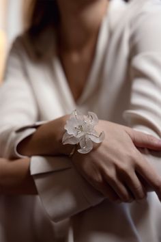 LongDesc Elegant Clear Bangle Jewelry, Elegant Clear Bracelet As Gift, Elegant Clear Bracelet Perfect For Gifts, Elegant Clear Bracelets As Gift, Luxury Flower Jewelry For Evening, Luxury Flower-shaped Jewelry For Evening, Elegant Transparent Bracelet For Gift, Luxury Flower-shaped Evening Jewelry, White Flower-shaped Evening Jewelry