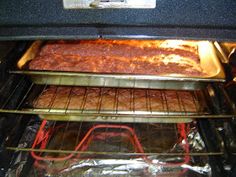 an oven with two trays of food cooking in it and one is on the bottom rack