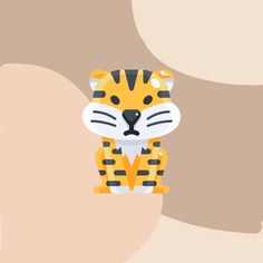 a paper cut out of a tiger sitting on top of a piece of paper with its eyes closed