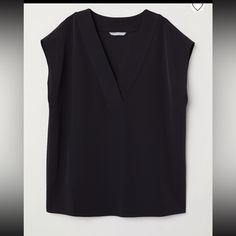 A Brand New With Tags Attached Blouse From H&M. In Perfect Condition, No Flaws. All Items Come From A Smoke Free Home. Cheap Fitted Blouse From H&m, H&m Short Sleeve Work Tops, H&m Short Sleeve Tops For Work, H&m V-neck Top For Night Out, H&m Blouse For Summer Workwear, H&m Summer Blouse For Night Out, H&m Summer Night Out Blouse, Chic Black H&m Blouse, H&m Summer Workwear Tops